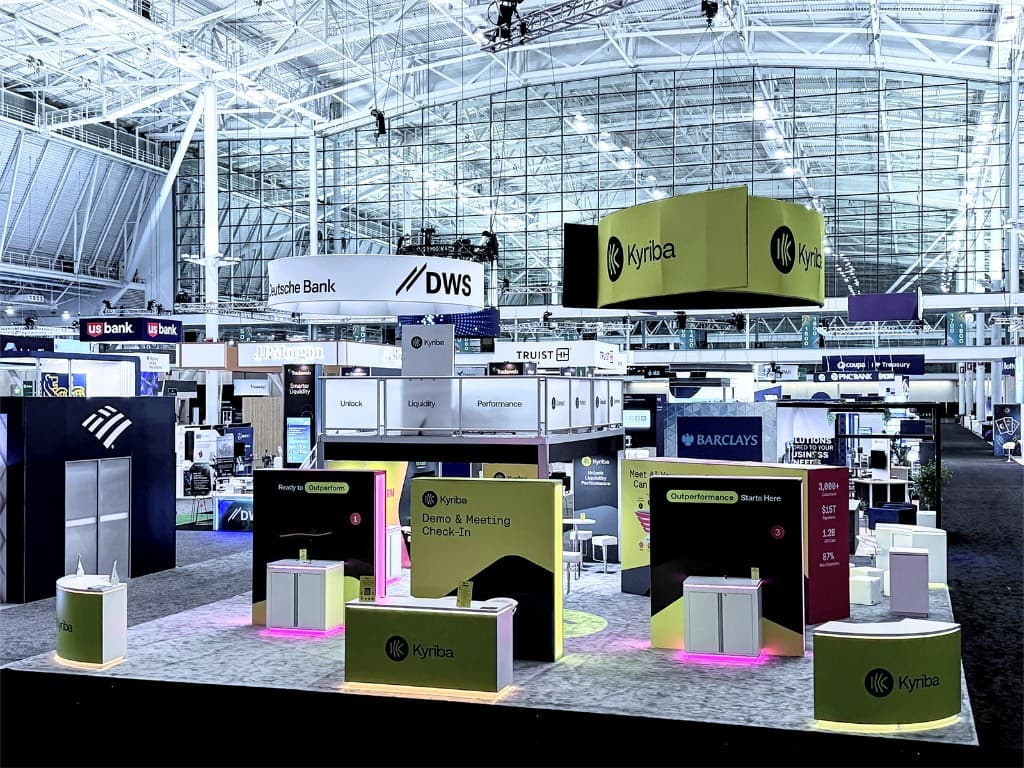 Large-scale Kyriba exhibit and surrounding booths on a major show floor