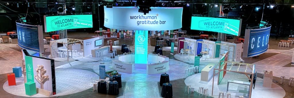 Workhuman corporate event floor with gratitude bar and branded activation zones