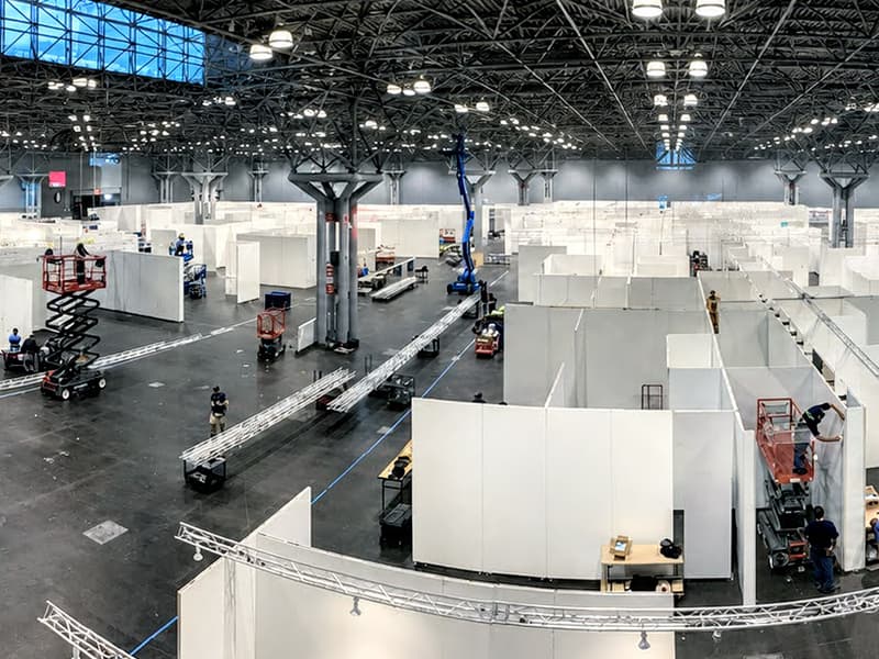 Crew installing an exhibit on the show floor